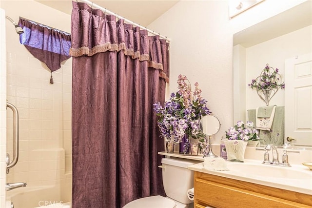 full bathroom featuring shower / bathtub combination with curtain, vanity, and toilet