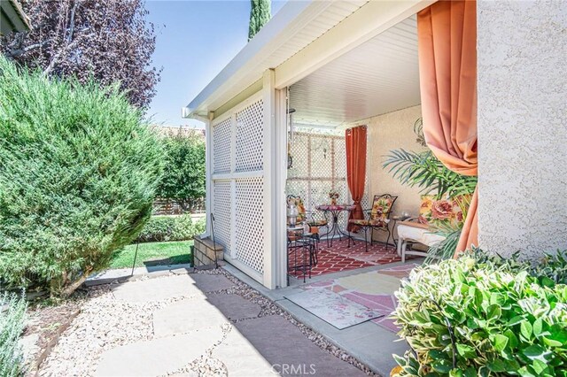 19046 Stoddard Way, Apple Valley, CA 92308 - property entrance featuring stucco siding