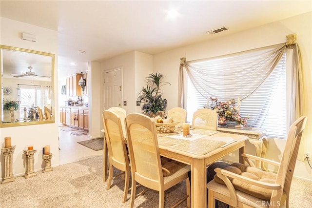 19046 Stoddard Way, Apple Valley, CA 92308 - dining room with light colored carpet and ceiling fan