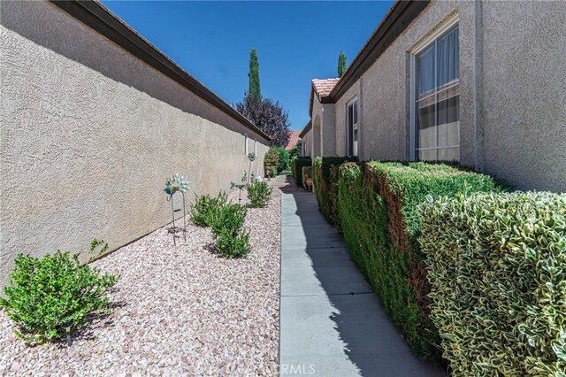 19046 Stoddard Way, Apple Valley, CA 92308 - view of side of home with stucco siding