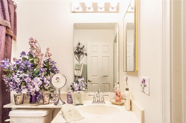 19046 Stoddard Way, Apple Valley, CA 92308 - bathroom featuring vanity and toilet