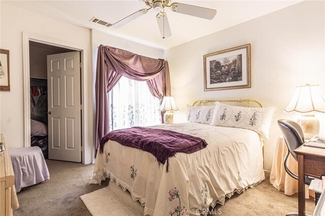 19046 Stoddard Way, Apple Valley, CA 92308 - bedroom with light carpet and ceiling fan