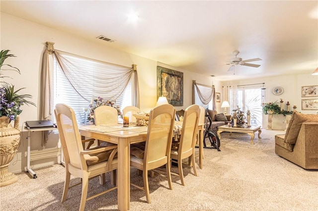 19046 Stoddard Way, Apple Valley, CA 92308 - dining space featuring light colored carpet and a ceiling fan