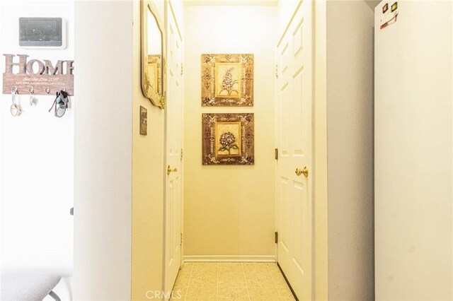 19046 Stoddard Way, Apple Valley, CA 92308 - corridor featuring baseboards