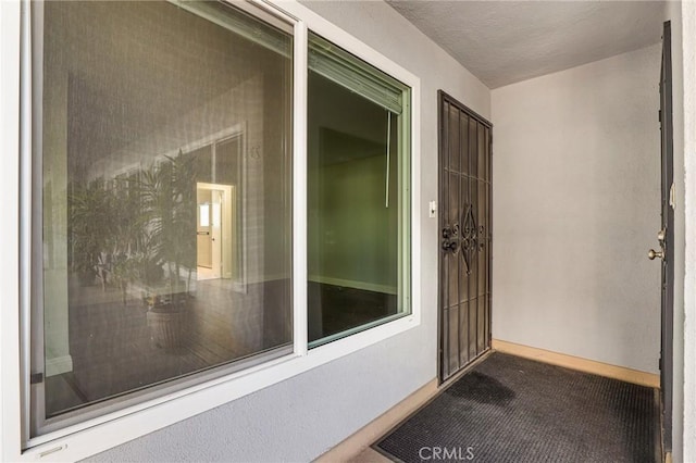 property entrance with covered porch