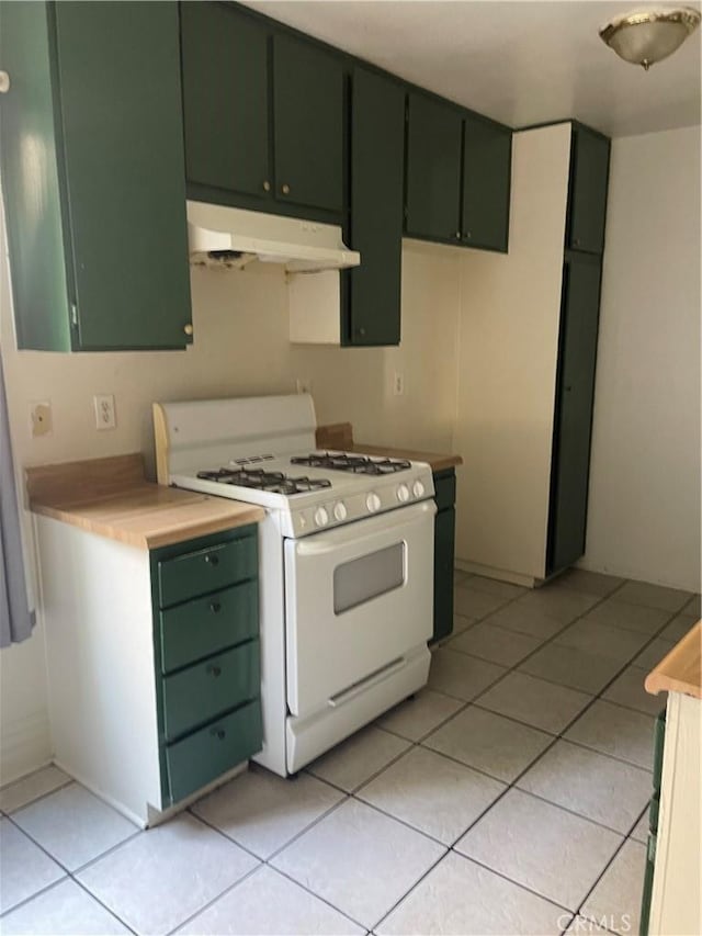 kitchen featuring green cabinets, light tile patterned floors, and white range with gas cooktop