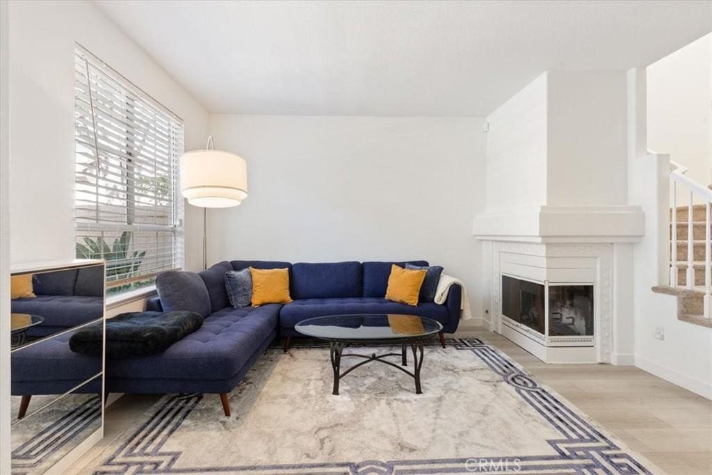 living room with light hardwood / wood-style floors