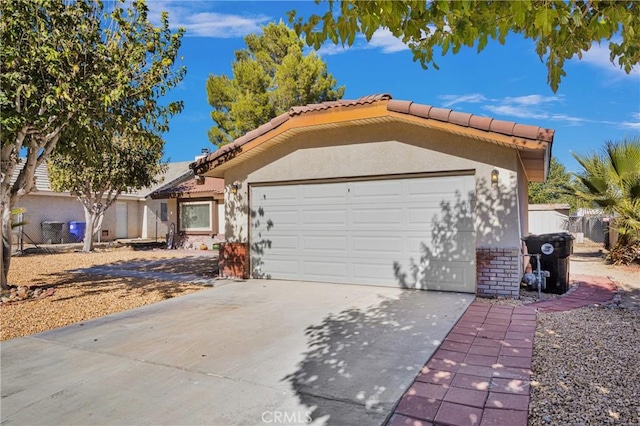 ranch-style home featuring a garage