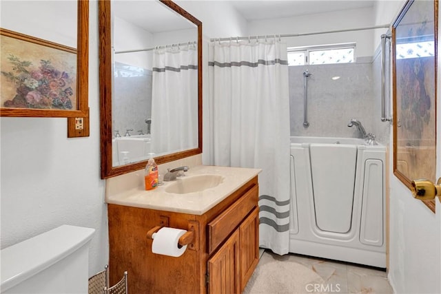 full bathroom with vanity, shower / bath combination with curtain, toilet, and washer / dryer