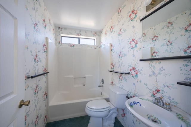 bathroom with toilet and shower / bath combination