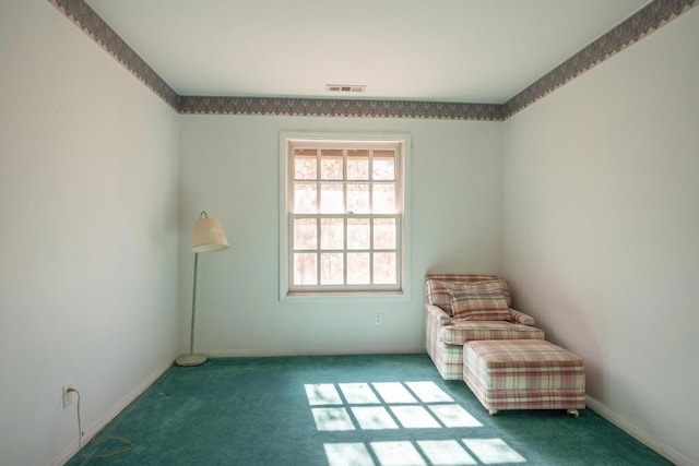 unfurnished room featuring dark colored carpet