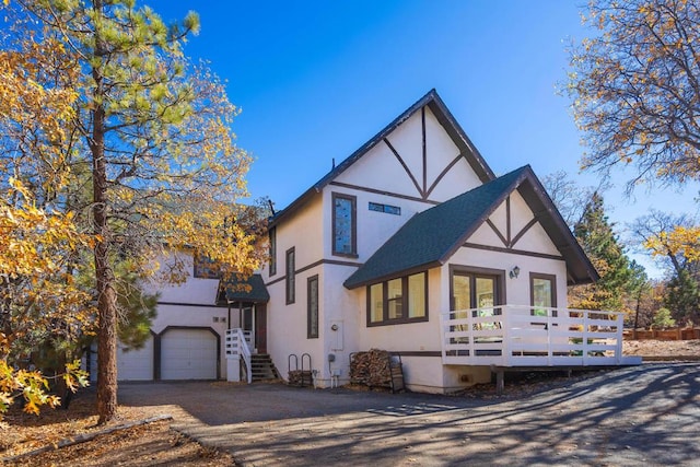 tudor house with a garage