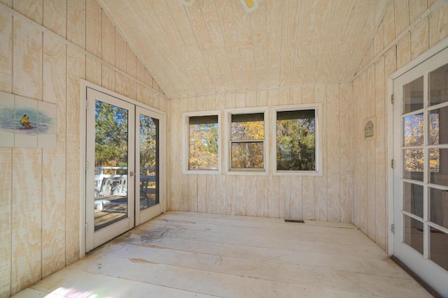 unfurnished sunroom with lofted ceiling, french doors, and wood ceiling