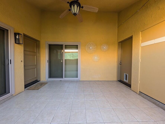 view of patio with ceiling fan