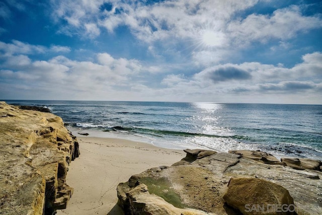 view of water feature featuring a beach view