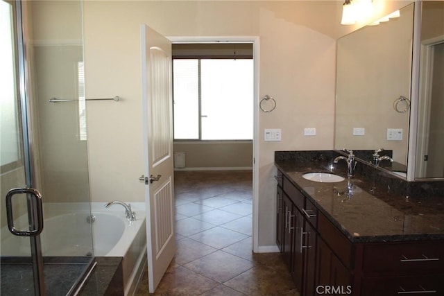 bathroom with tile patterned floors, vanity, and plus walk in shower