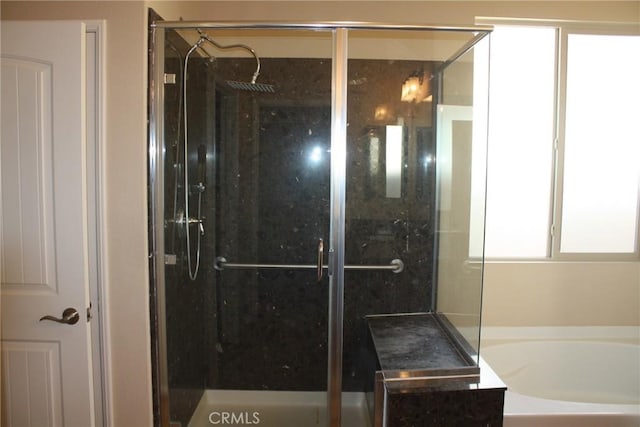 bathroom with independent shower and bath