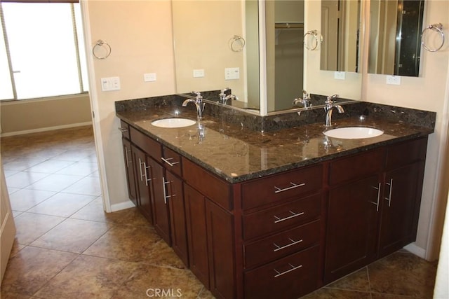 bathroom with vanity and tile patterned floors