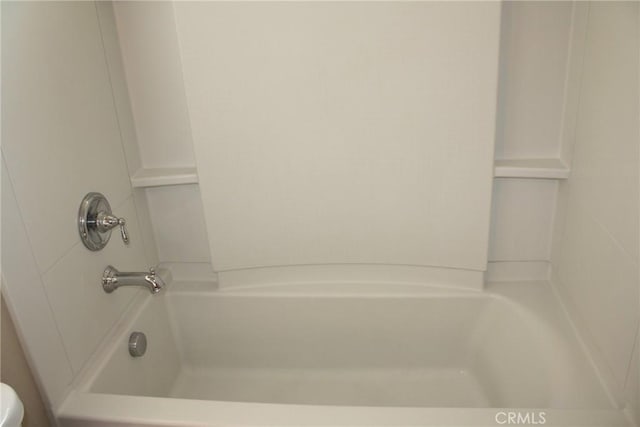 bathroom featuring washtub / shower combination