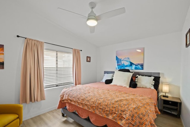 bedroom featuring ceiling fan and light hardwood / wood-style floors