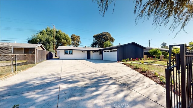 ranch-style home featuring a garage