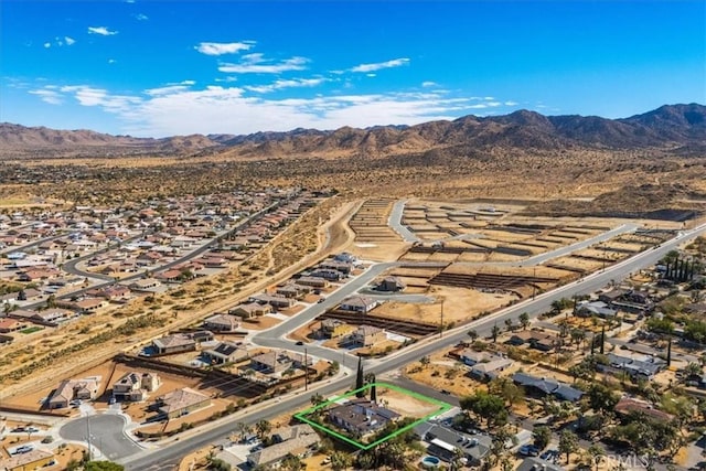 drone / aerial view featuring a mountain view