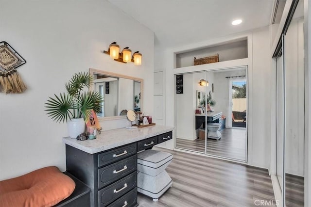 mudroom with dark hardwood / wood-style floors