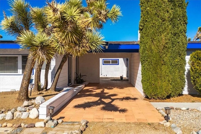 view of home's exterior featuring a patio area