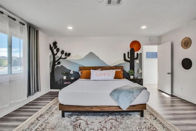 bedroom featuring wood-type flooring