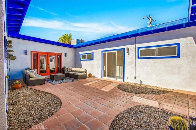 view of patio / terrace with french doors and an outdoor hangout area