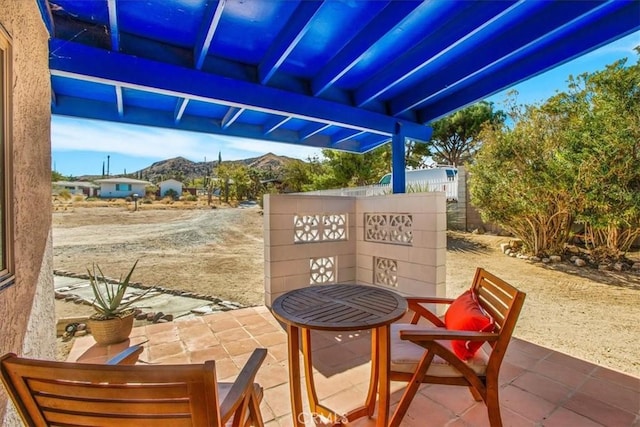 view of patio with a mountain view