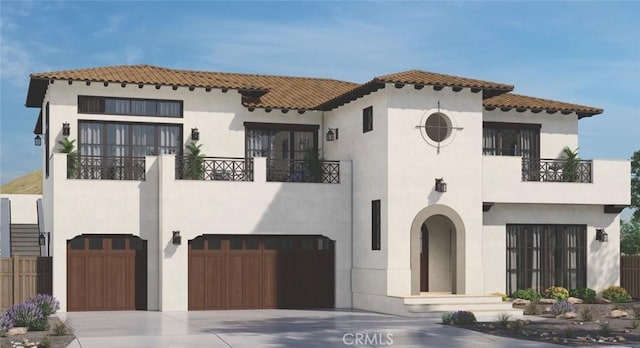 mediterranean / spanish-style home with a balcony and a garage