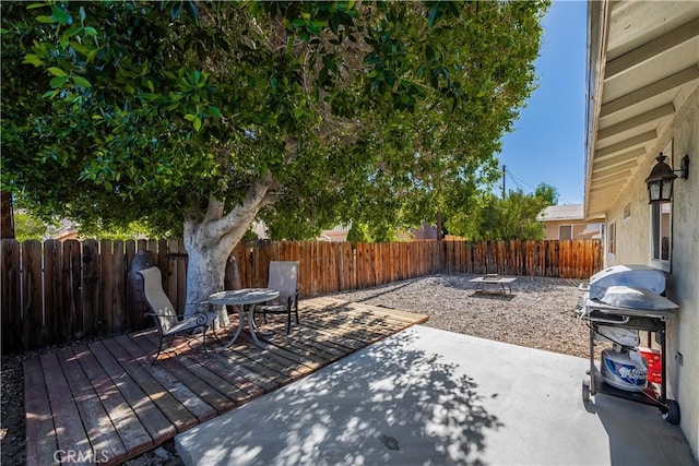 view of patio featuring a deck and grilling area