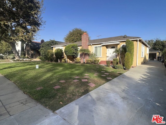 view of front of house with a front yard