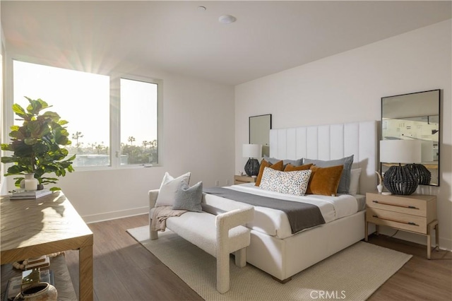 bedroom featuring dark hardwood / wood-style floors