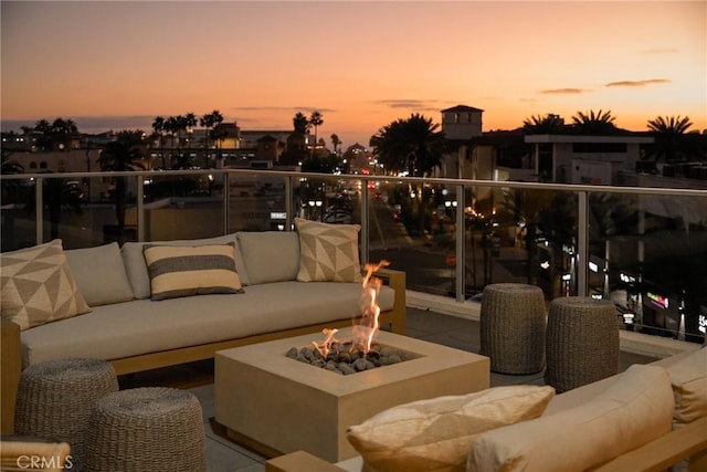 patio terrace at dusk with an outdoor living space