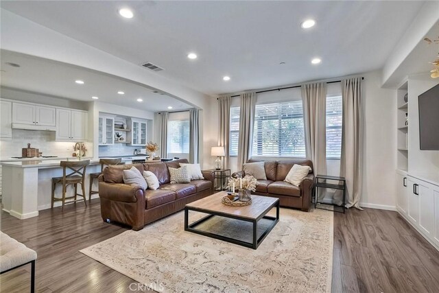 living room with hardwood / wood-style flooring