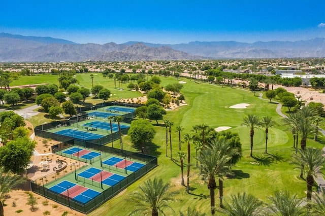 birds eye view of property featuring a mountain view