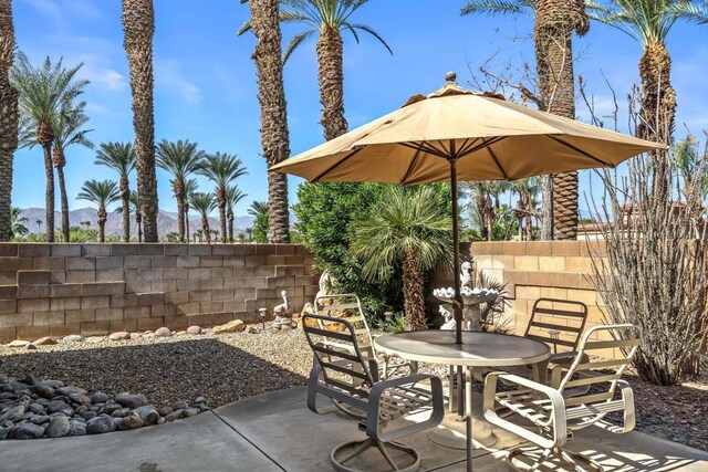 view of patio with a mountain view