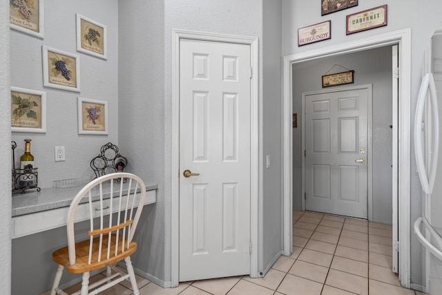 office with light tile patterned floors