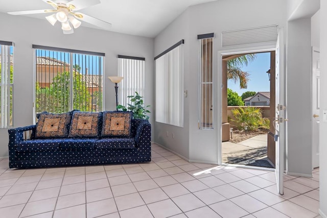 tiled foyer with ceiling fan