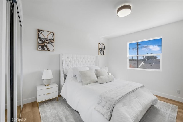 bedroom featuring hardwood / wood-style floors