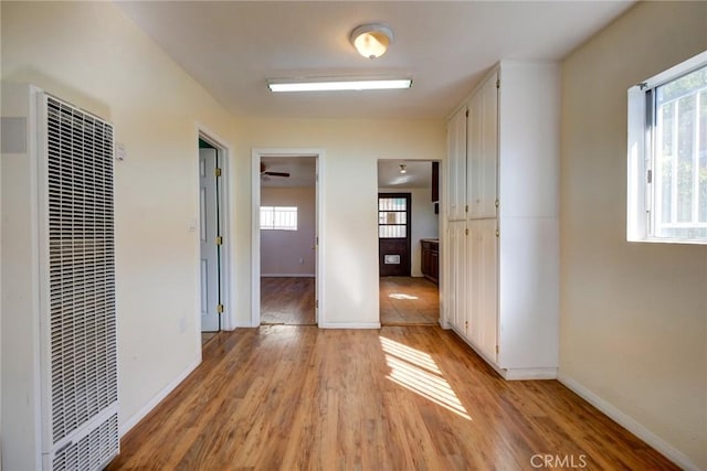 hallway featuring light hardwood / wood-style floors