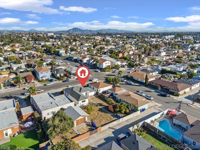 drone / aerial view featuring a mountain view