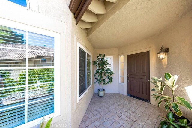 27551 Paseo Tamara, San Juan Capistrano, CA 92675 - doorway to property with stucco siding