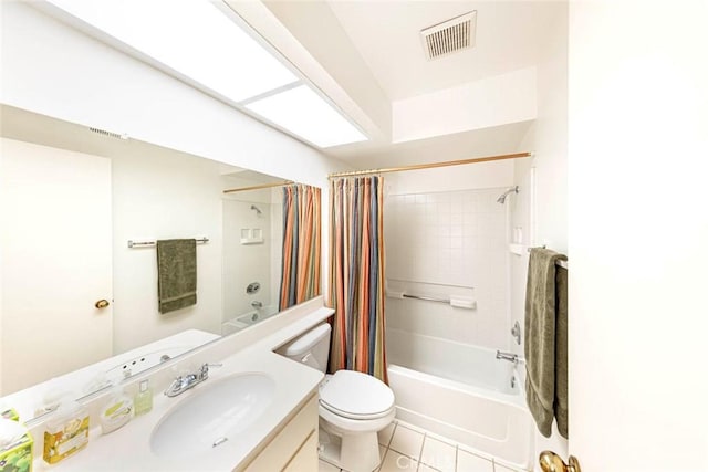 full bathroom with tile patterned floors, vanity, shower / bath combo, and toilet