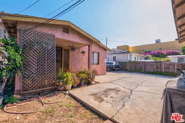 view of home's exterior with a patio