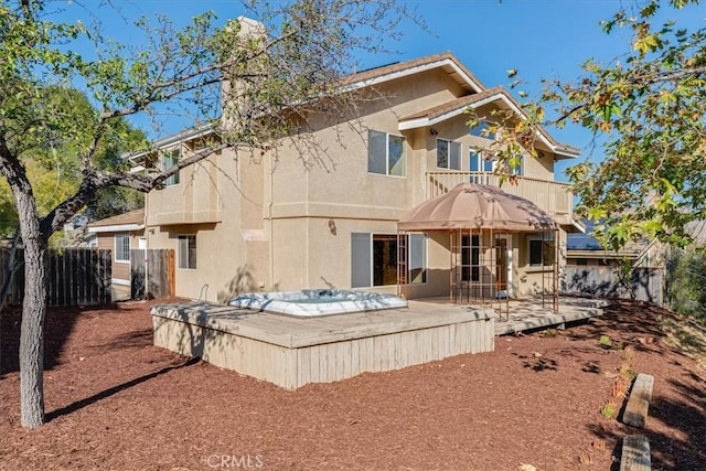 rear view of property with a patio area