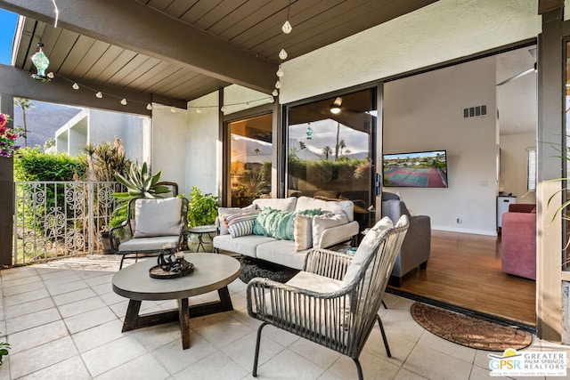 view of patio with an outdoor hangout area