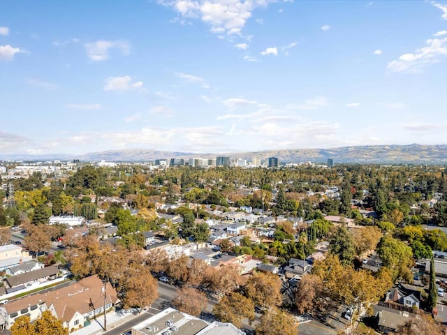 birds eye view of property featuring a mountain view